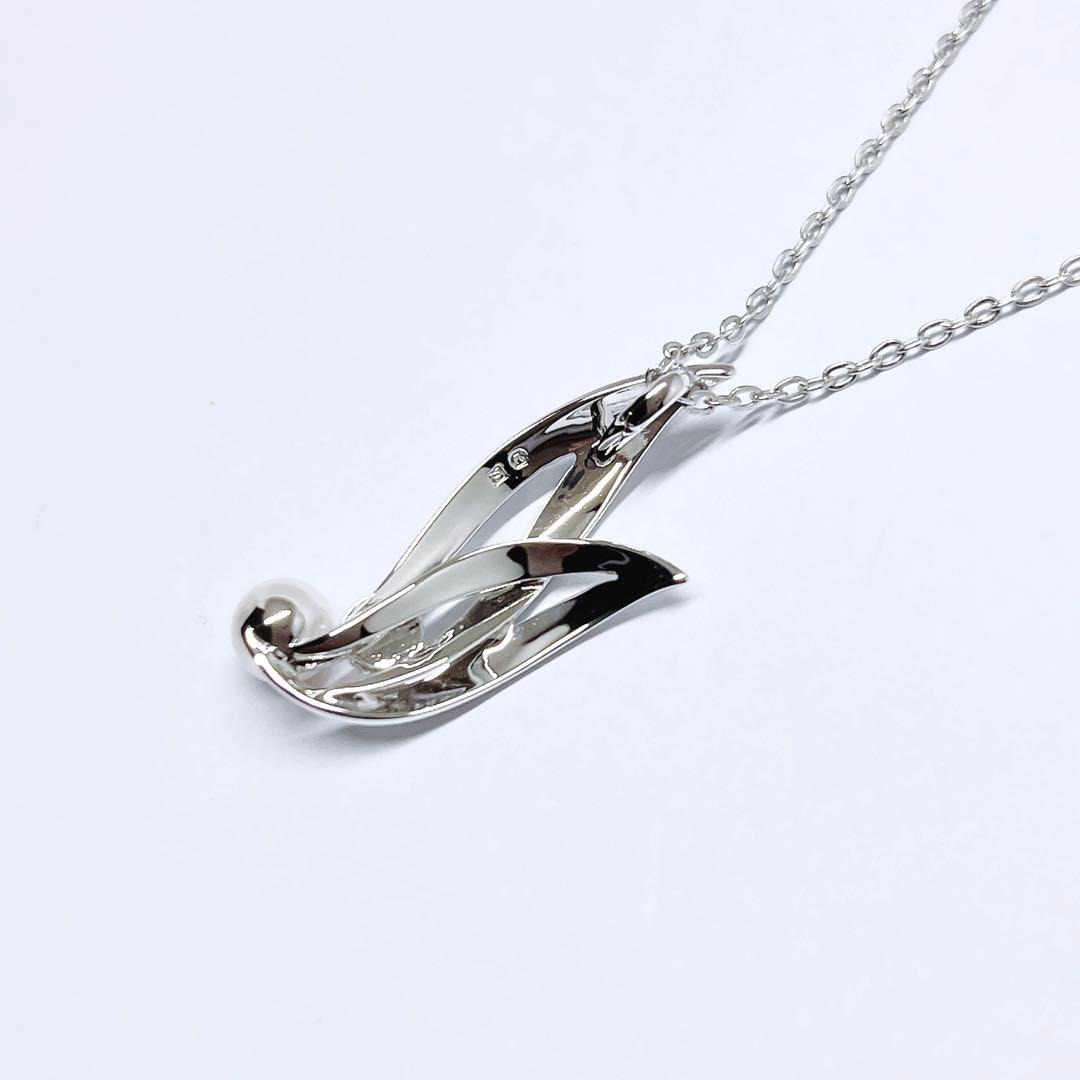MIKIMOTO Baby Pearl Necklace with 5.1mm pearls and chrysanthemum mon pendant on silver chain