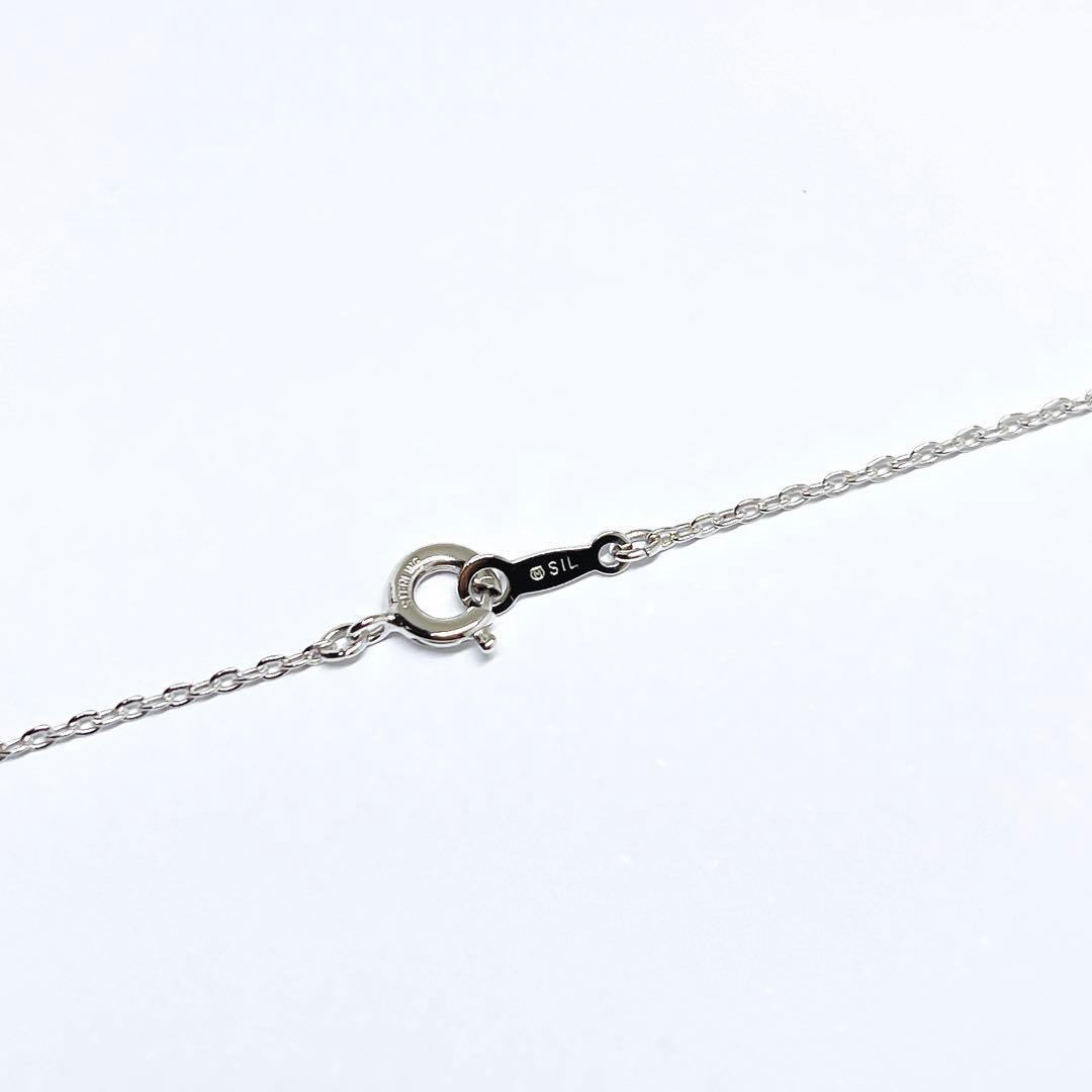 MIKIMOTO Baby Pearl Necklace with 5.1mm pearls and chrysanthemum mon pendant on silver chain