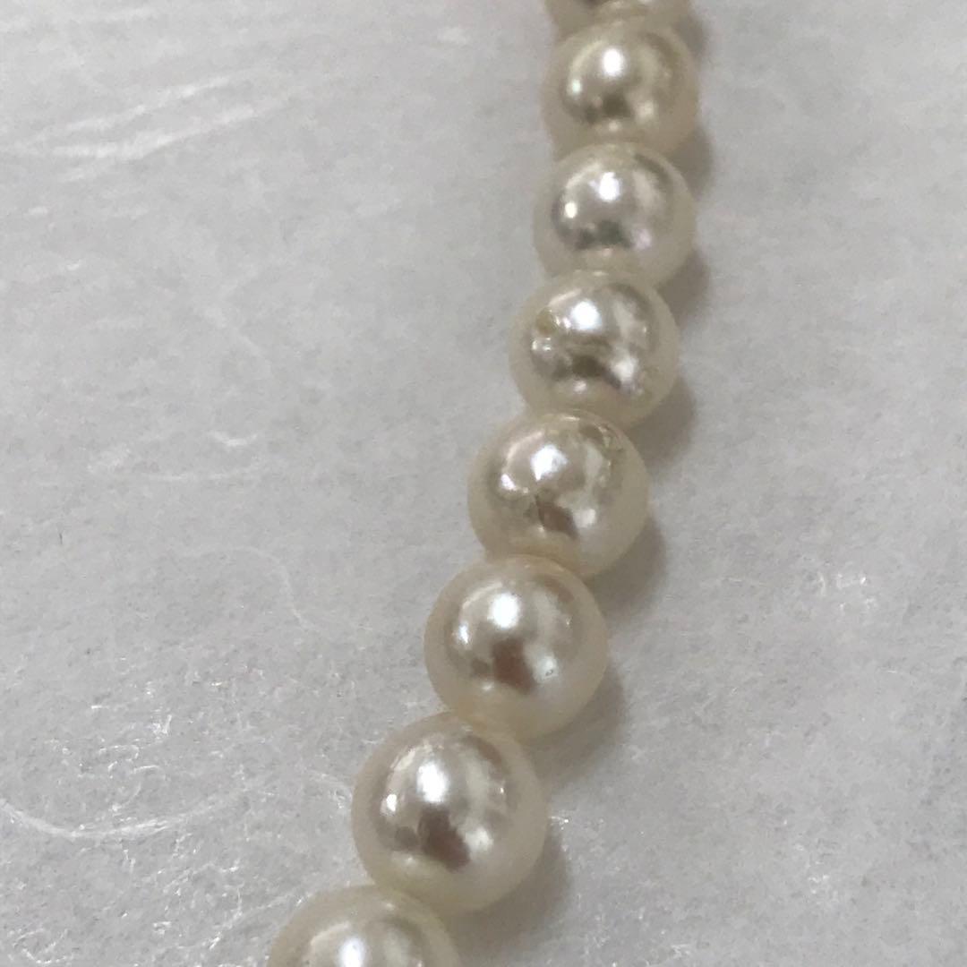 Akoya pearl semi-long necklace measuring 60cm with 7 to 7.5mm pearls and a silver 925 insert clasp with inscription