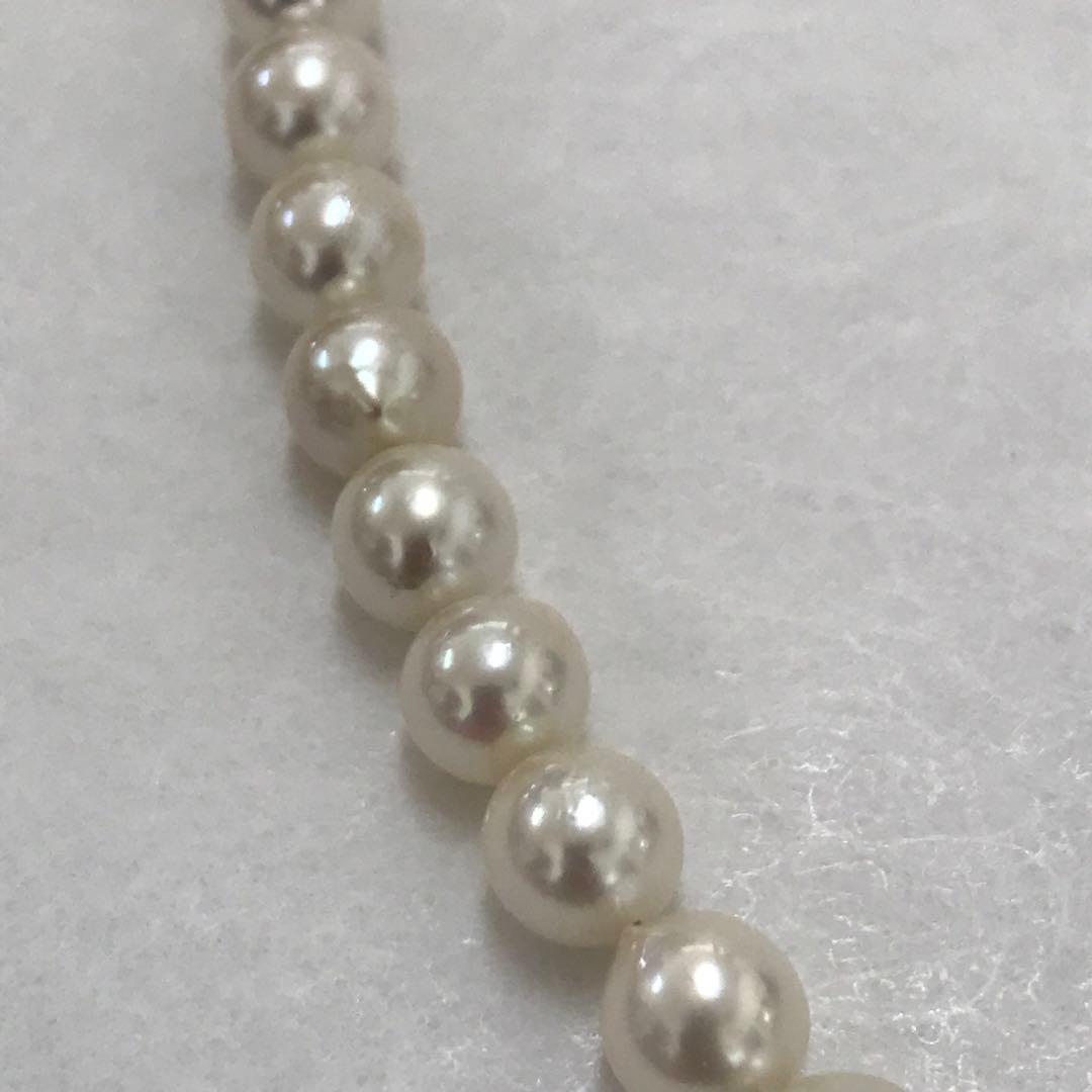 Akoya pearl semi-long necklace measuring 60cm with 7 to 7.5mm pearls and a silver 925 insert clasp with inscription