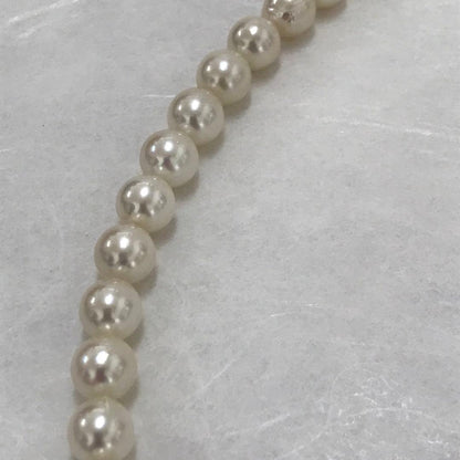 Akoya pearl semi-long necklace measuring 60cm with 7 to 7.5mm pearls and a silver 925 insert clasp with inscription