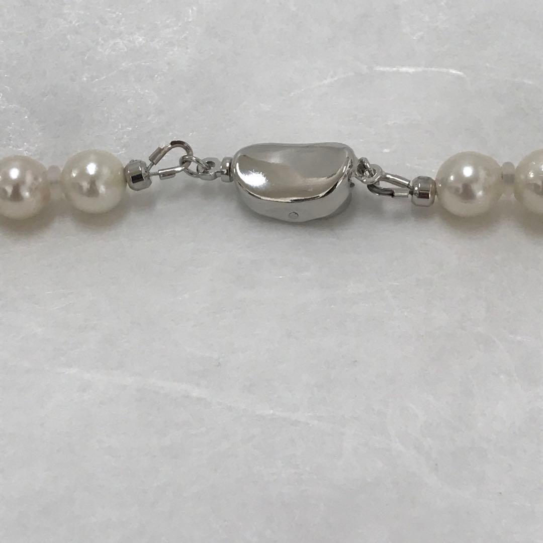 Akoya pearl semi-long necklace measuring 60cm with 7 to 7.5mm pearls and a silver 925 insert clasp with inscription