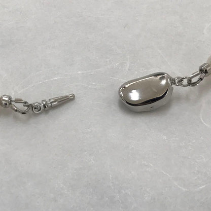 Akoya pearl semi-long necklace measuring 60cm with 7 to 7.5mm pearls and a silver 925 insert clasp with inscription