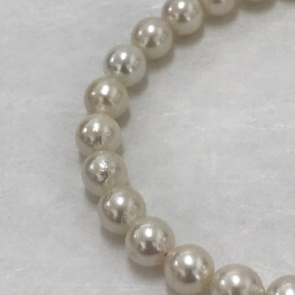 Akoya pearl semi-long necklace measuring 60cm with 7 to 7.5mm pearls and a silver 925 insert clasp with inscription