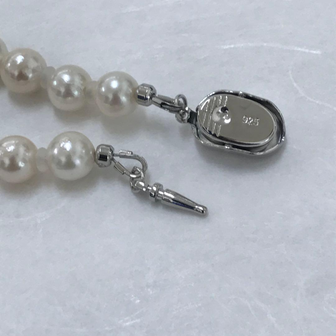 Akoya pearl semi-long necklace measuring 60cm with 7 to 7.5mm pearls and a silver 925 insert clasp with inscription