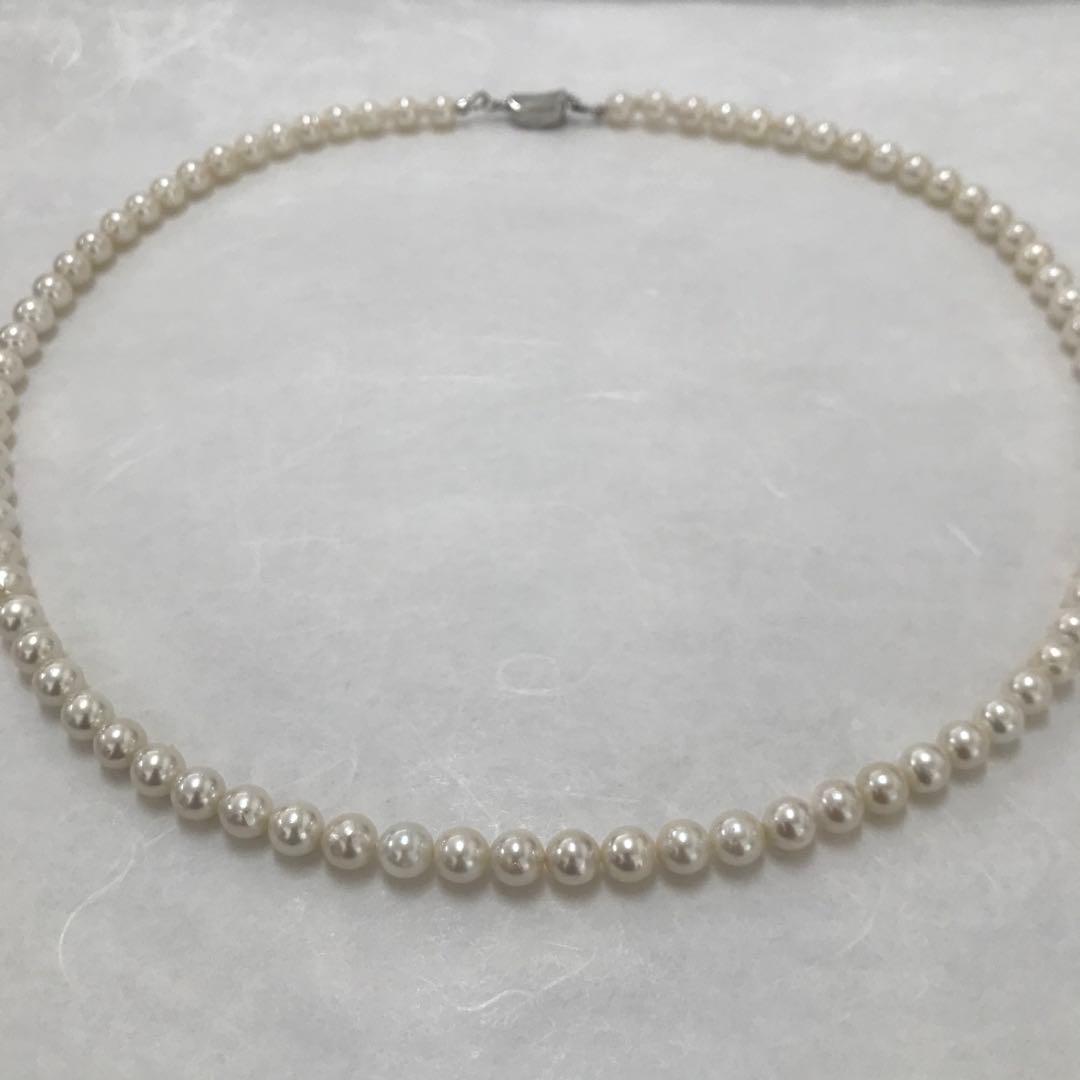 Akoya pearl semi-long necklace measuring 60cm with 7 to 7.5mm pearls and a silver 925 insert clasp with inscription