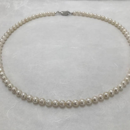 Akoya pearl semi-long necklace measuring 60cm with 7 to 7.5mm pearls and a silver 925 insert clasp with inscription