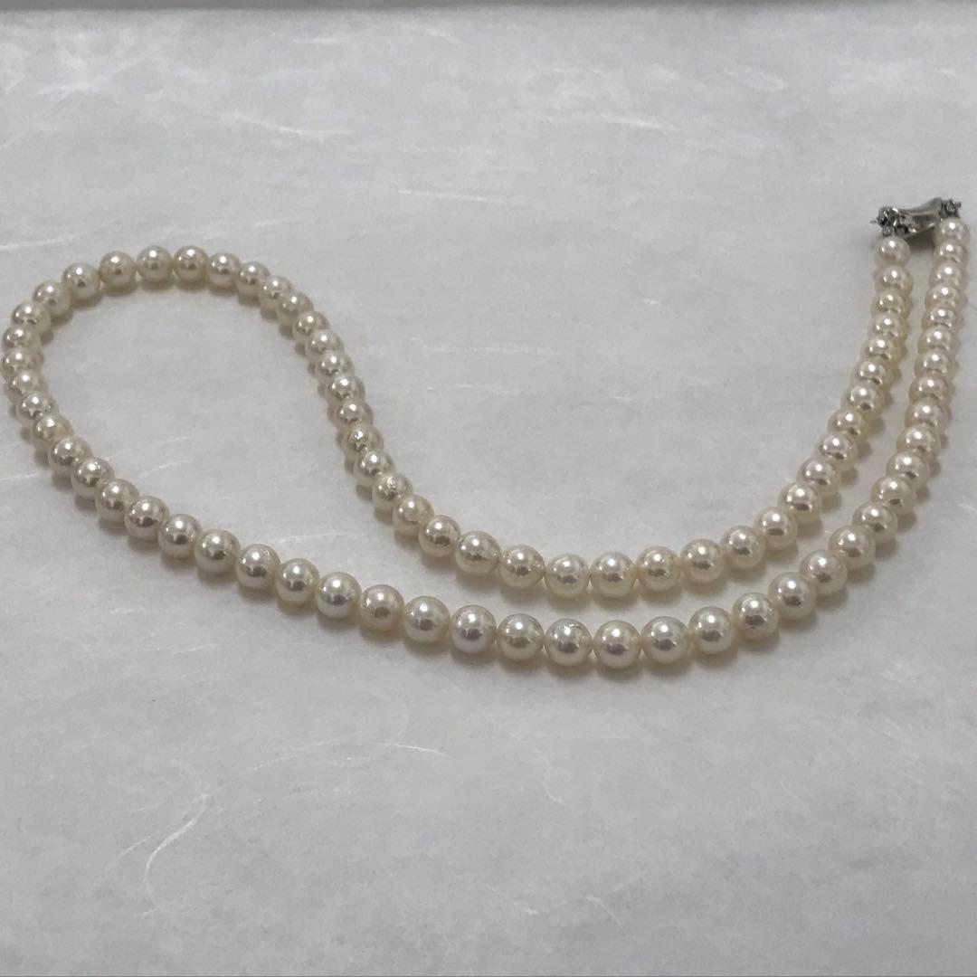 Akoya pearl semi-long necklace measuring 60cm with 7 to 7.5mm pearls and a silver 925 insert clasp with inscription
