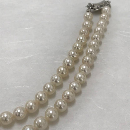Akoya pearl semi-long necklace measuring 60cm with 7 to 7.5mm pearls and a silver 925 insert clasp with inscription