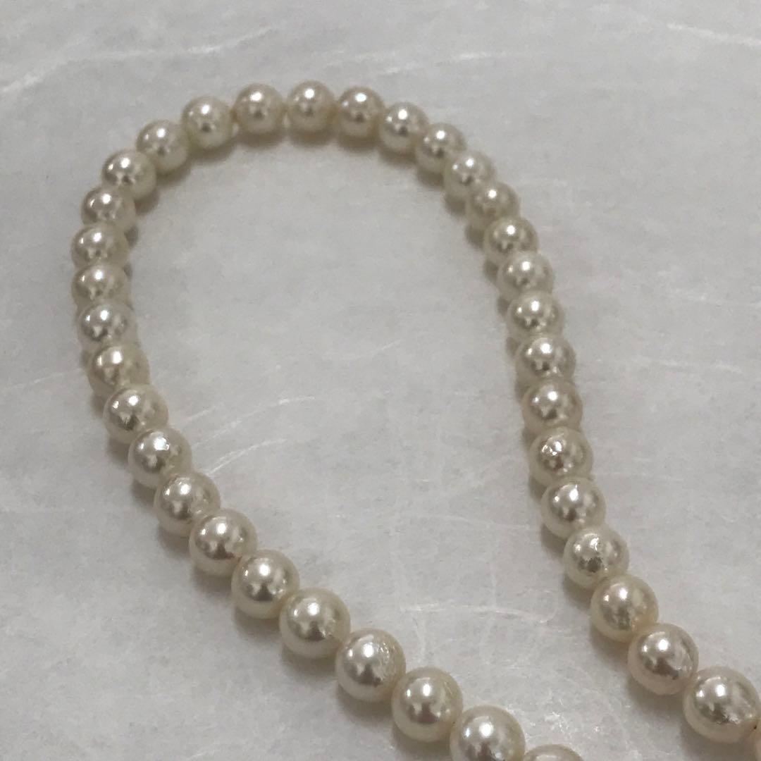 Akoya pearl semi-long necklace measuring 60cm with 7 to 7.5mm pearls and a silver 925 insert clasp with inscription