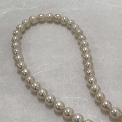 Akoya pearl semi-long necklace measuring 60cm with 7 to 7.5mm pearls and a silver 925 insert clasp with inscription