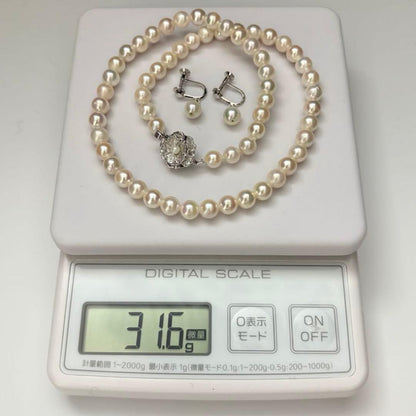 Aurora interference color Akoya pearl necklace and matching earrings with round white pearls and silver accents