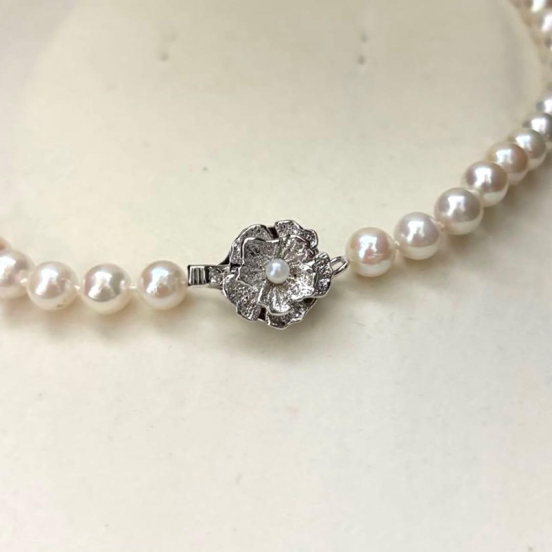 Aurora interference color Akoya pearl necklace and matching earrings with round white pearls and silver accents