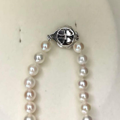 Aurora interference color Akoya pearl necklace and matching earrings with round white pearls and silver accents