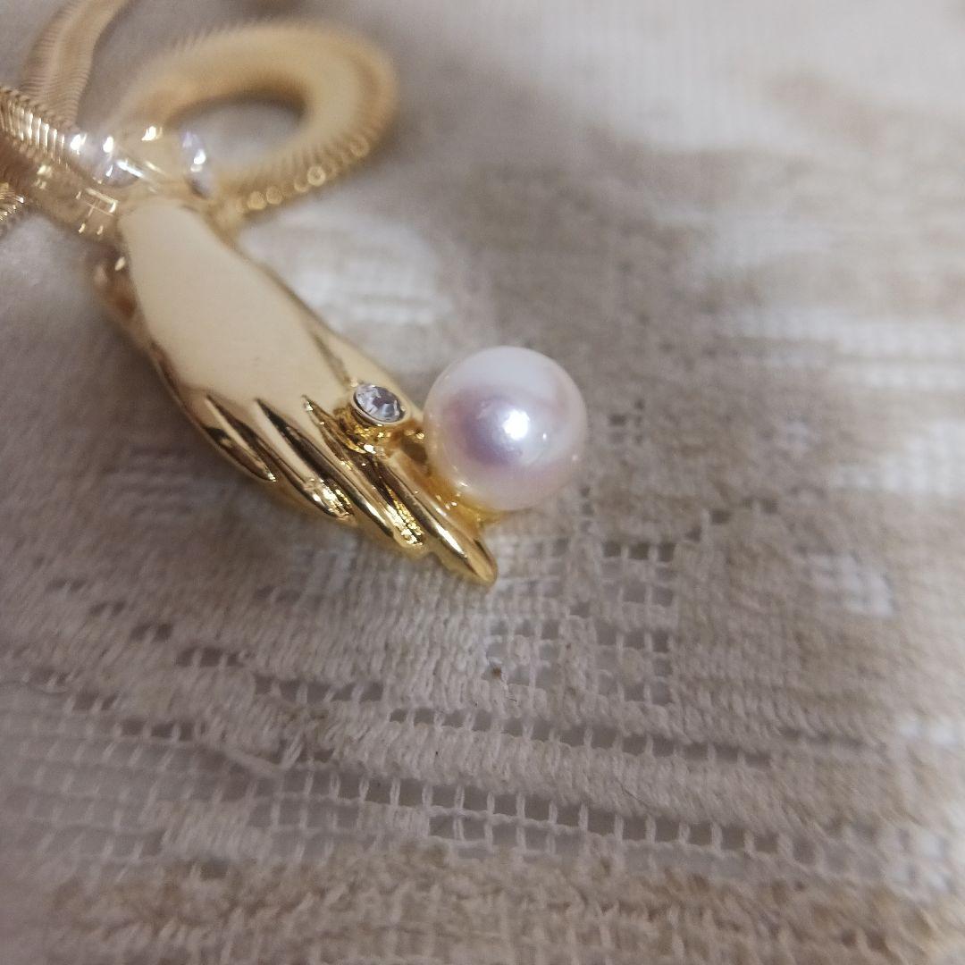 Ise-Shima Akoya Pearl Hand Motif Necklace with 45 cm chain displayed on white background