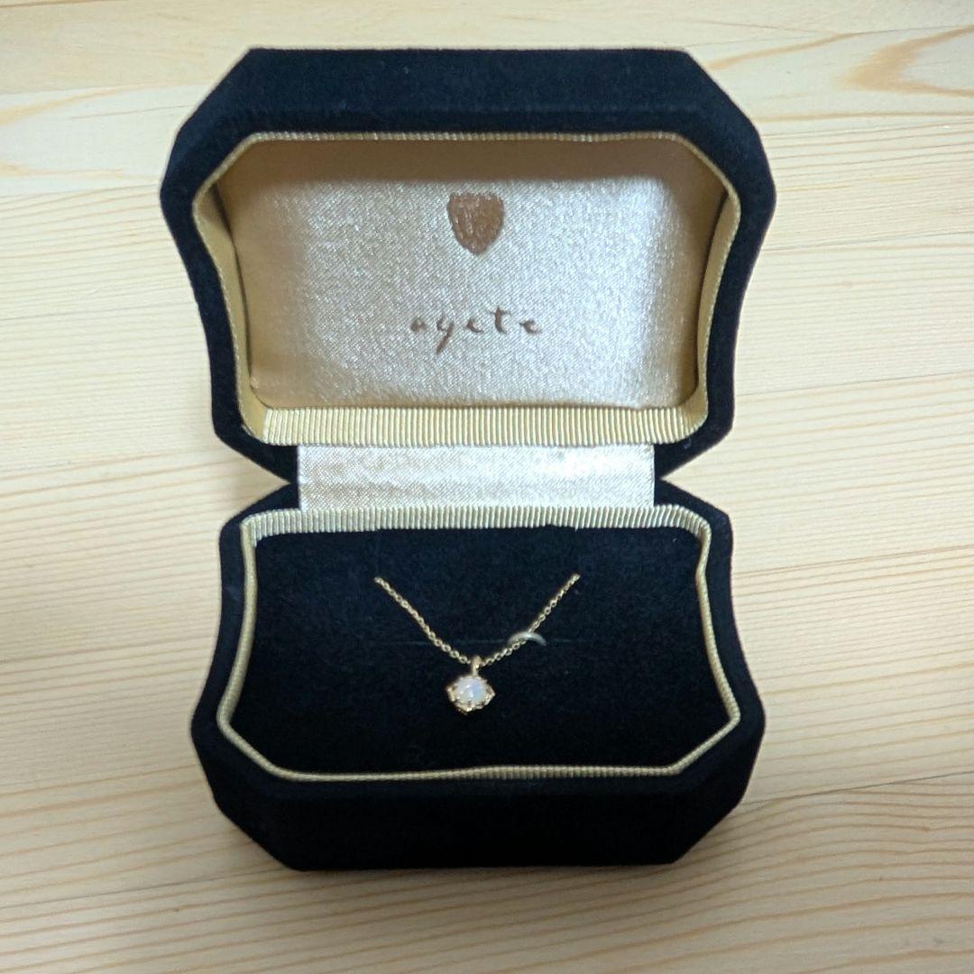 Enel Limited Edition K10 necklace featuring opal and diamond with 40cm length and delicate design