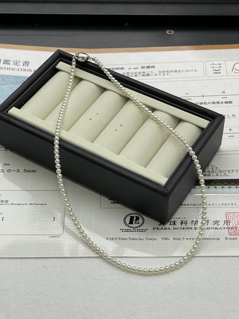 Akoya Pearl necklace with round untone Aurora iridescent pearls 3-3.5mm and silver star-shaped clasp