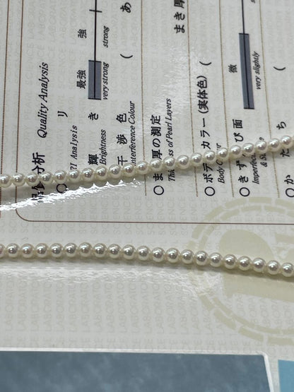 Akoya Pearl necklace with round untone Aurora iridescent pearls 3-3.5mm and silver star-shaped clasp