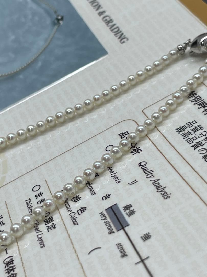 Akoya Pearl necklace with round untone Aurora iridescent pearls 3-3.5mm and silver star-shaped clasp
