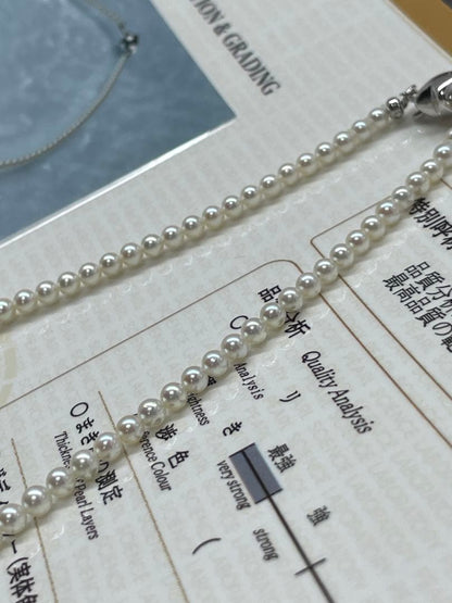 Akoya Pearl necklace with round untone Aurora iridescent pearls 3-3.5mm and silver star-shaped clasp