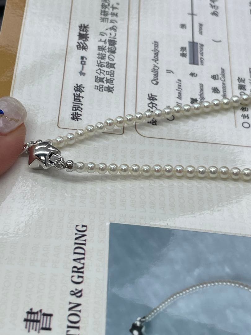 Akoya Pearl necklace with round untone Aurora iridescent pearls 3-3.5mm and silver star-shaped clasp