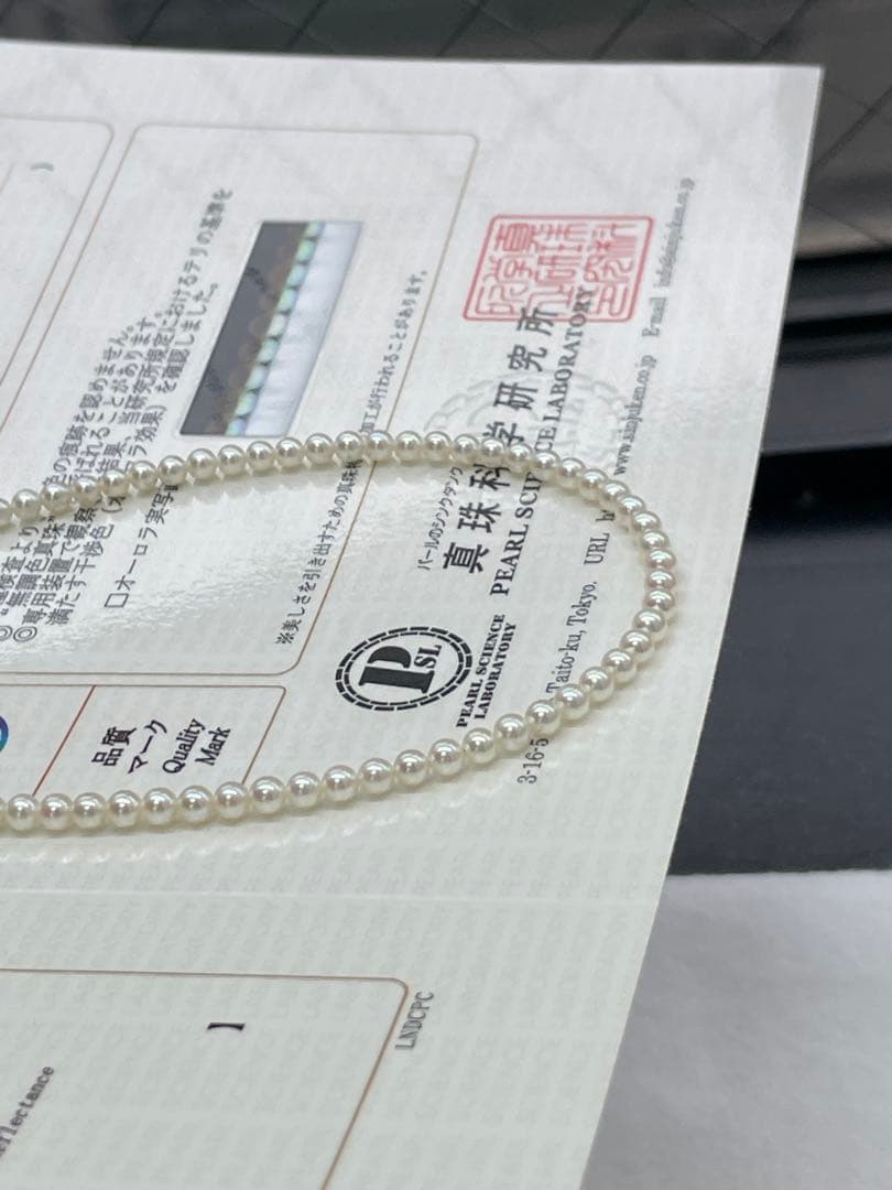 Akoya Pearl necklace with round untone Aurora iridescent pearls 3-3.5mm and silver star-shaped clasp