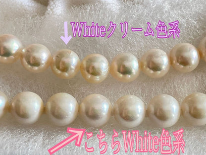 8.5mm Akoya pearl necklace with silver clasp and matching round pearl earrings featuring exposed flesh markings