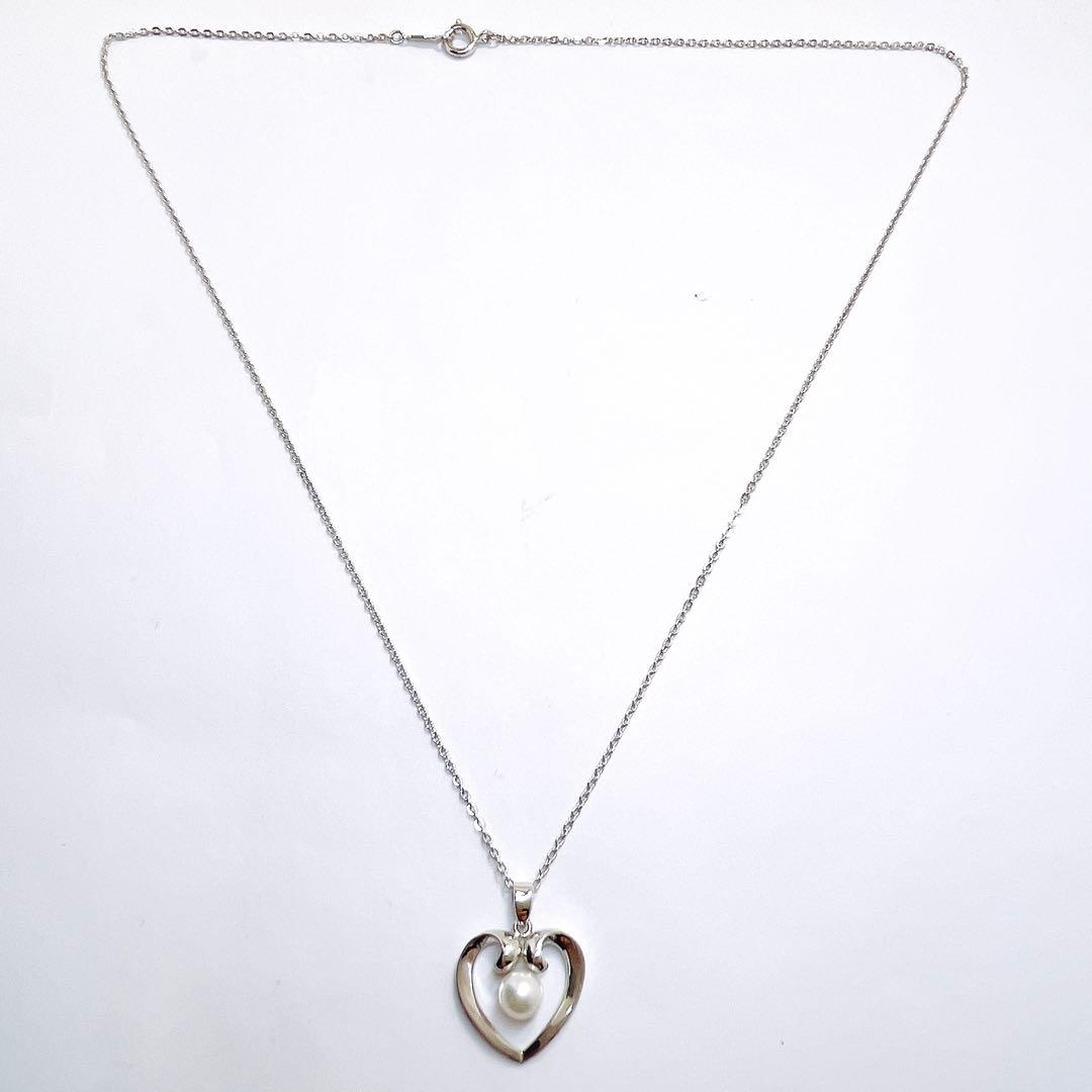 Mikimoto pearl necklace with heart motif featuring 5.4mm pearls on a 46cm silver chain