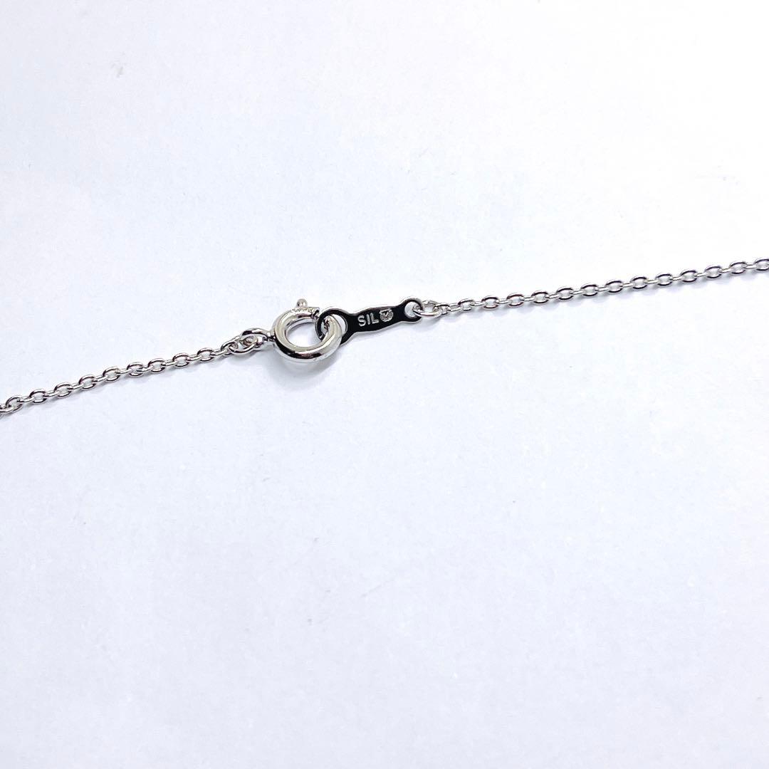 Mikimoto pearl necklace with heart motif featuring 5.4mm pearls on a 46cm silver chain