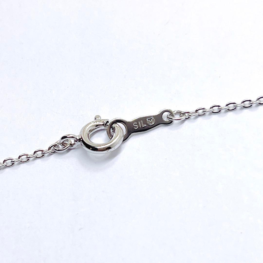 Mikimoto pearl necklace with heart motif featuring 5.4mm pearls on a 46cm silver chain