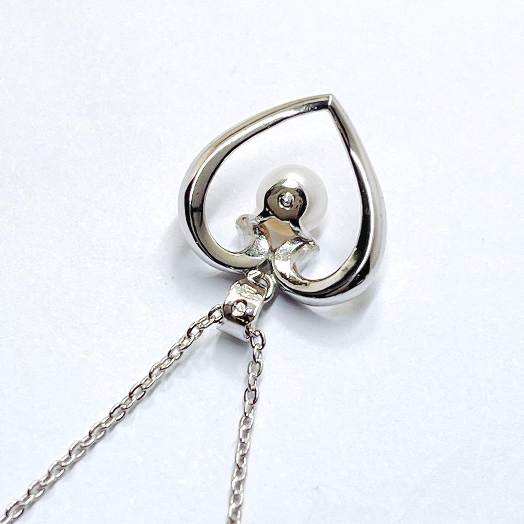 Mikimoto pearl necklace with heart motif featuring 5.4mm pearls on a 46cm silver chain