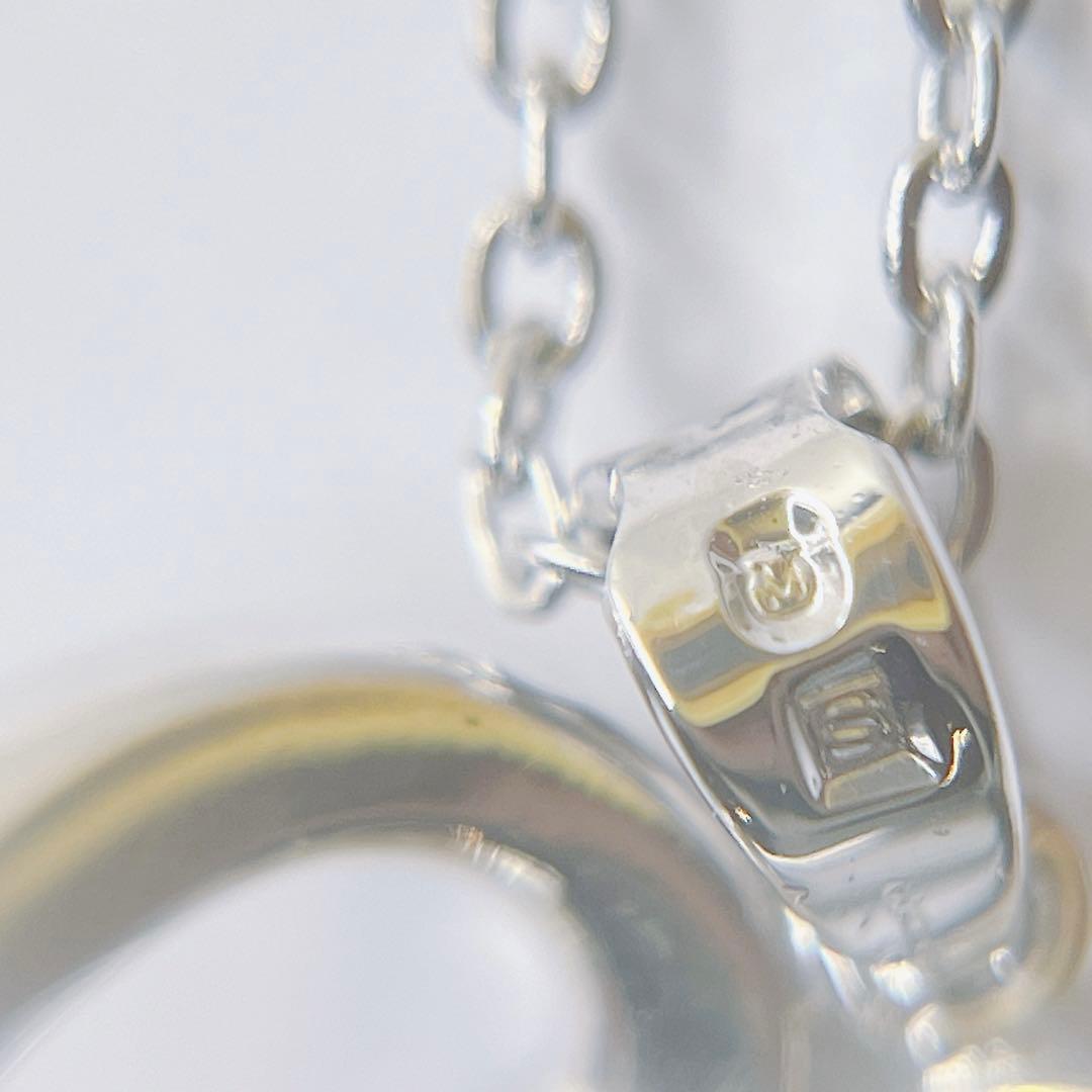 Mikimoto pearl necklace with heart motif featuring 5.4mm pearls on a 46cm silver chain