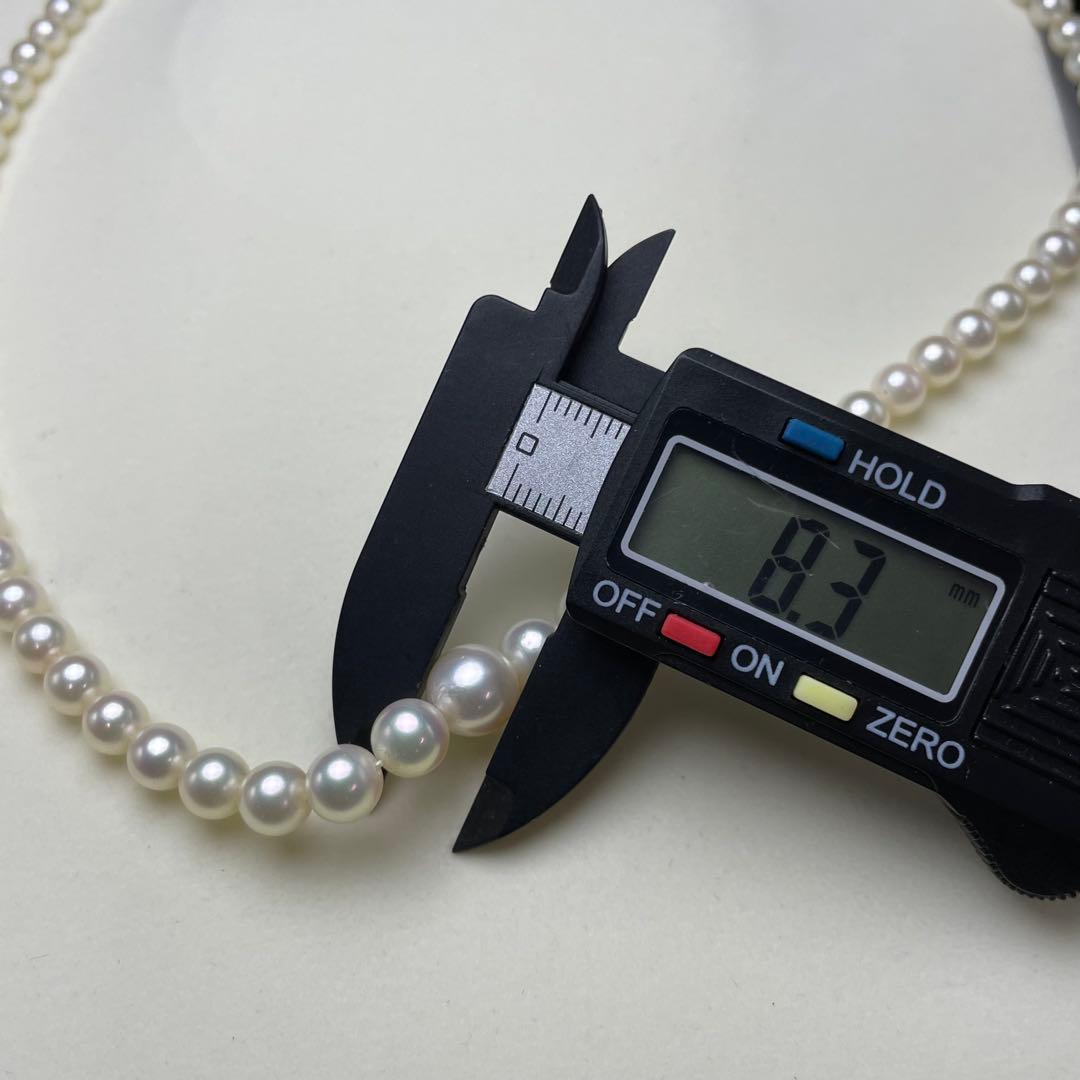 Mikimoto Akoya pearls necklace featuring white 4.5-8.5mm pearls with K14 clasp and pinkish natural interference color