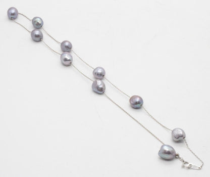 Tasaki Station Baroque Pearl Necklace with cobalt blue pearls and white gold clasp, adjustable length 37-45cm