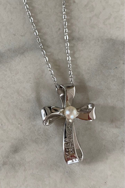 Mikimoto pearl necklace with 4-5mm pearls and cross motif pendant on a 39cm chain