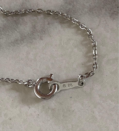 Mikimoto pearl necklace with 4-5mm pearls and cross motif pendant on a 39cm chain