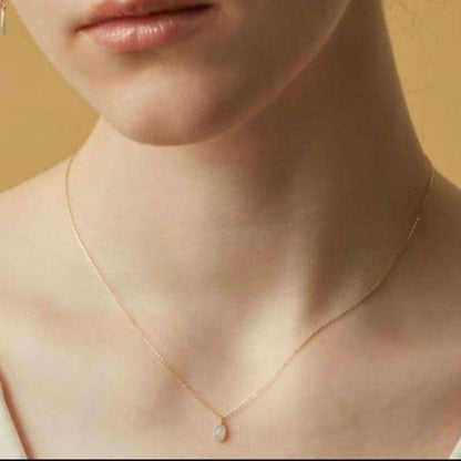 Agat K10 gold necklace with opal pendant measuring 0.6 x 0.4 cm on 40 cm chain