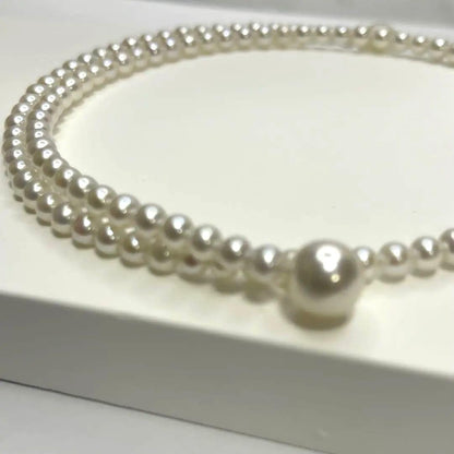 Authentic Akoya pearl baby pearl choker necklace with 8.5-9mm pearls and white freshwater pearls, clasp closure