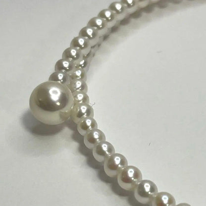 Authentic Akoya pearl baby pearl choker necklace with 8.5-9mm pearls and white freshwater pearls, clasp closure