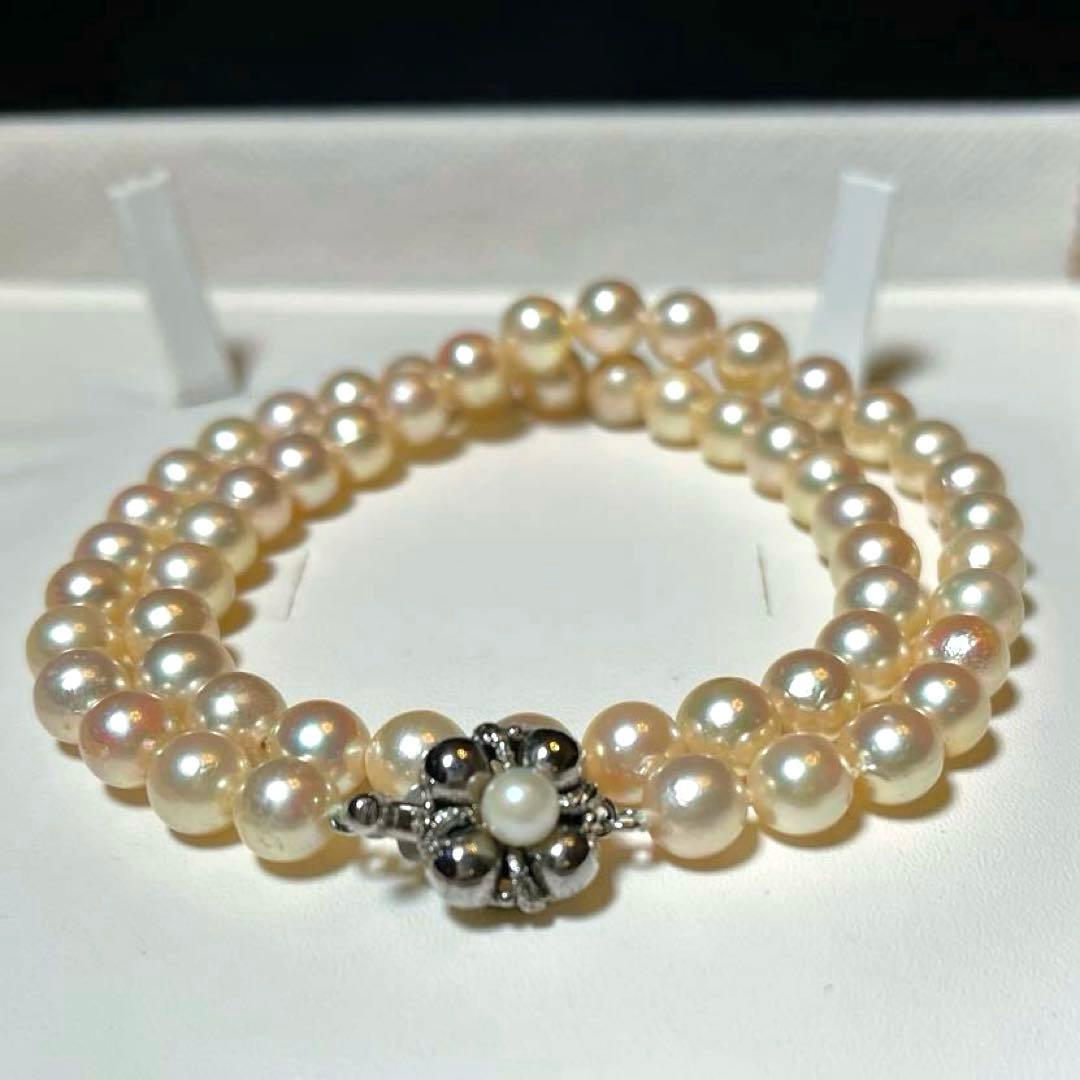 Akoya pearls necklace with 7.0-7.5mm white round pearls and silver stamp on a 42.5 cm chain