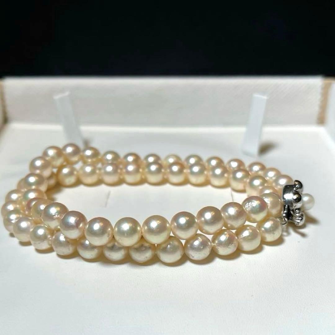 Akoya pearls necklace with 7.0-7.5mm white round pearls and silver stamp on a 42.5 cm chain