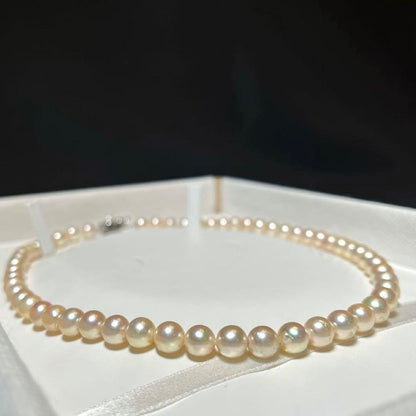 Akoya pearls necklace with 7.0-7.5mm white round pearls and silver stamp on a 42.5 cm chain