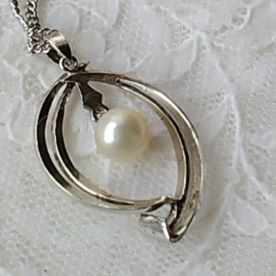 Mikimoto silver open ring with 6.4mm Akoya pearl necklace and 42cm chain displayed on white background