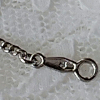 Mikimoto silver open ring with 6.4mm Akoya pearl necklace and 42cm chain displayed on white background