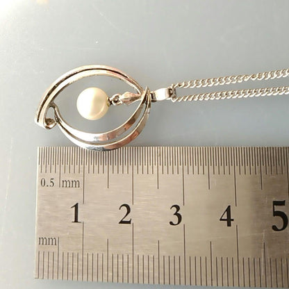 Mikimoto silver open ring with 6.4mm Akoya pearl necklace and 42cm chain displayed on white background