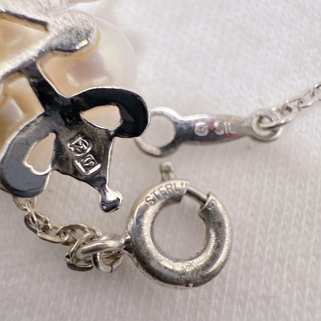 Mikimoto silver necklace featuring three Akoya pearls on a 40cm chain