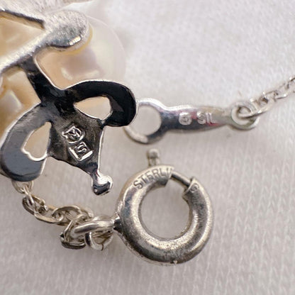 Mikimoto silver necklace featuring three Akoya pearls on a 40cm chain