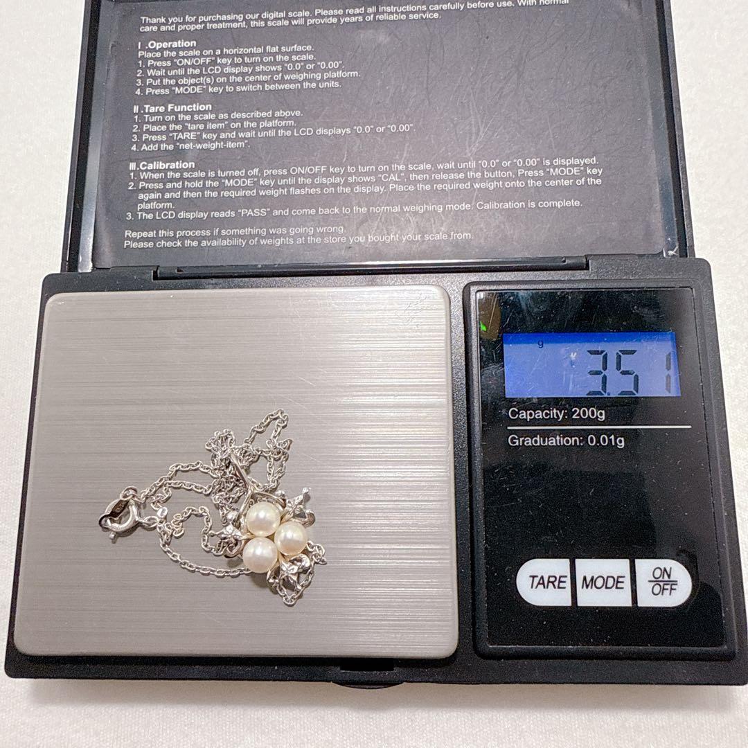 Mikimoto silver necklace featuring three Akoya pearls on a 40cm chain