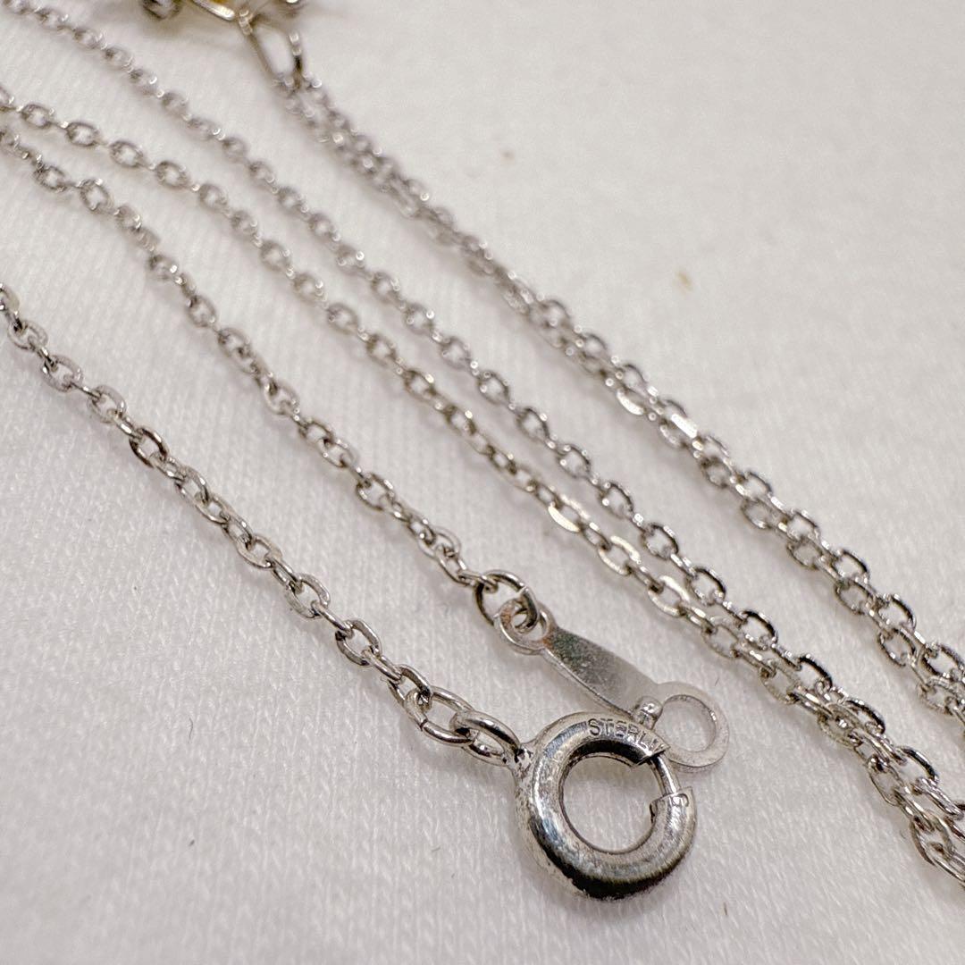 Mikimoto silver necklace featuring three Akoya pearls on a 40cm chain