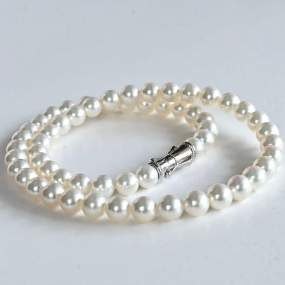 Highest grade Aurora Hanadama Tazaki Akoya pearl necklace with 7.5mm round pearls and silver clasp